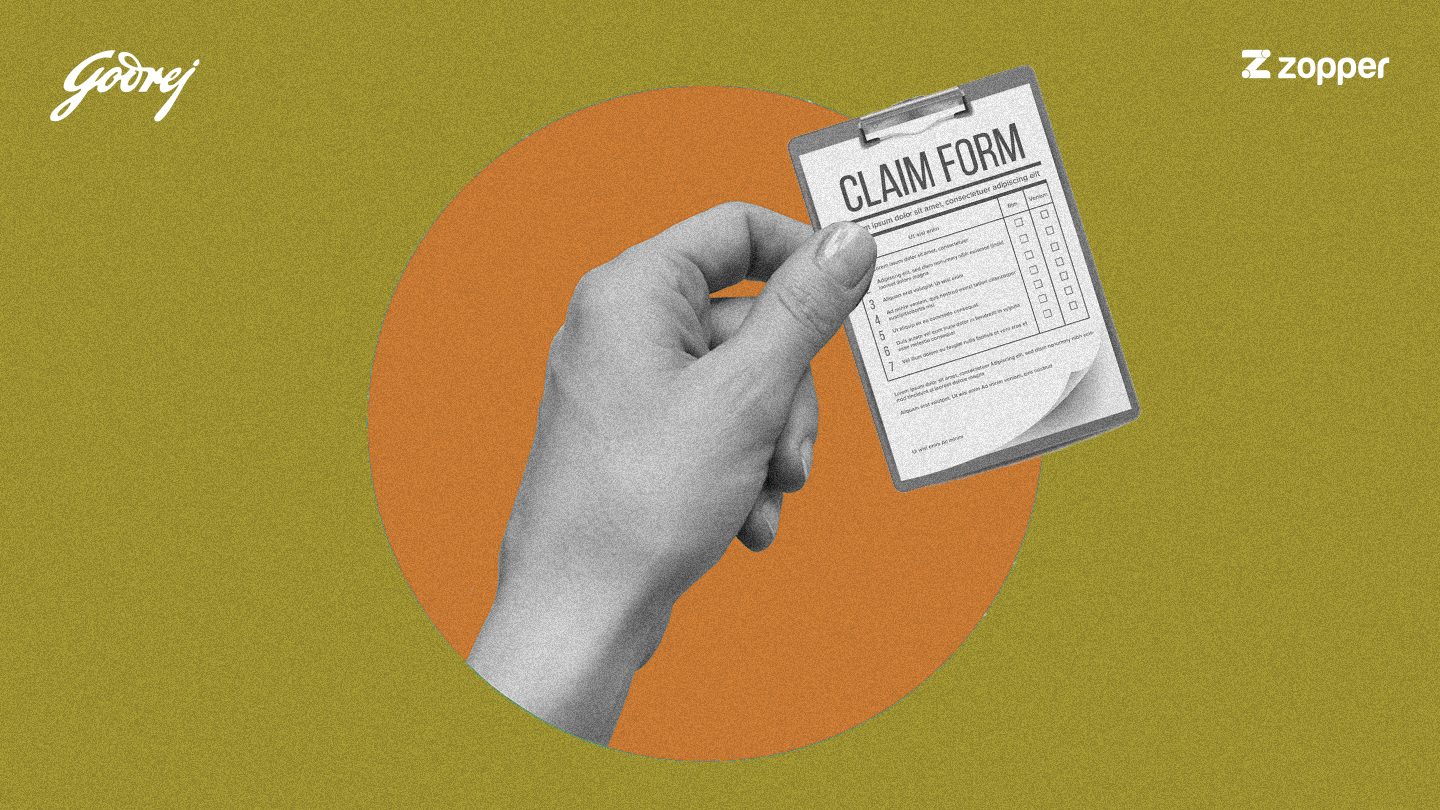 Hand holding a clipboard with a claim form against an orange circle and olive-green background, with Godrej and Zopper logos.