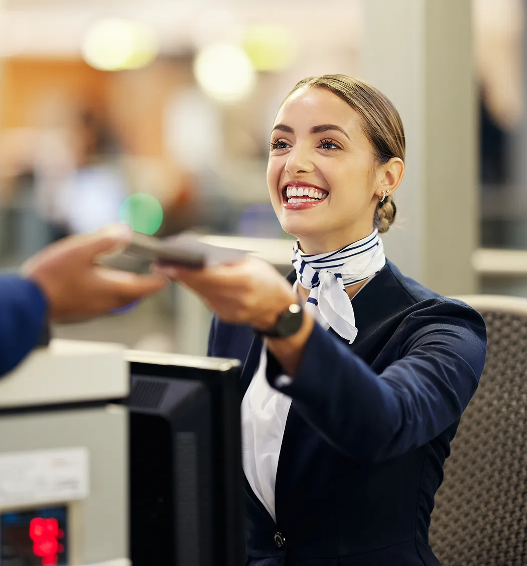 Woman working at the airport registration desk