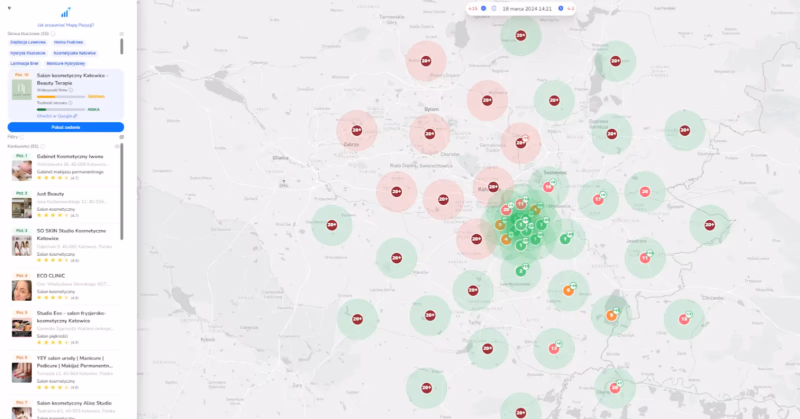 Zrzut ekranu narzędzia do monitoringu pozycji pokazujący mapę ze skupiskiem zielonych punktów w centrum Katowic w marcu 2024