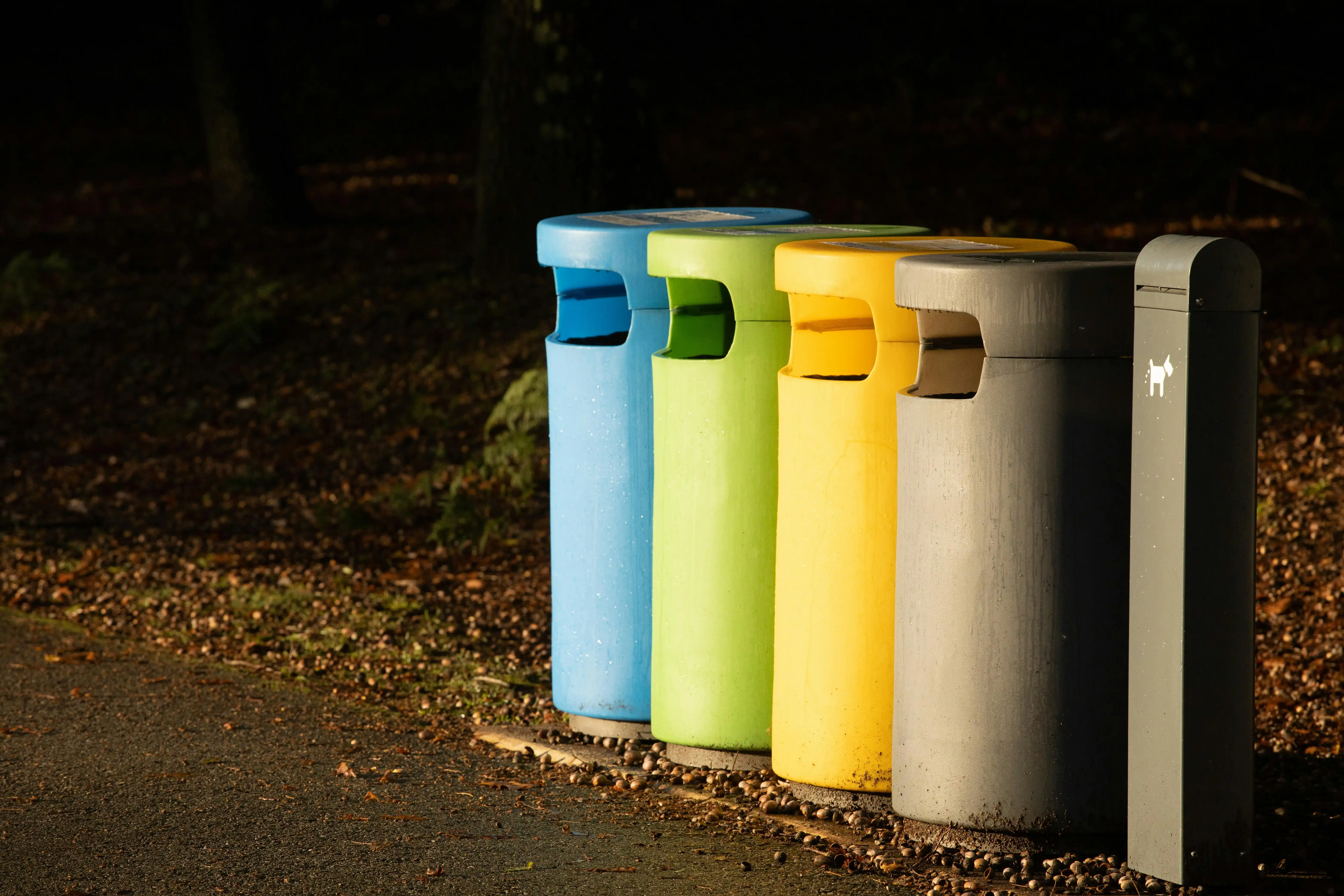 Four recycling bins