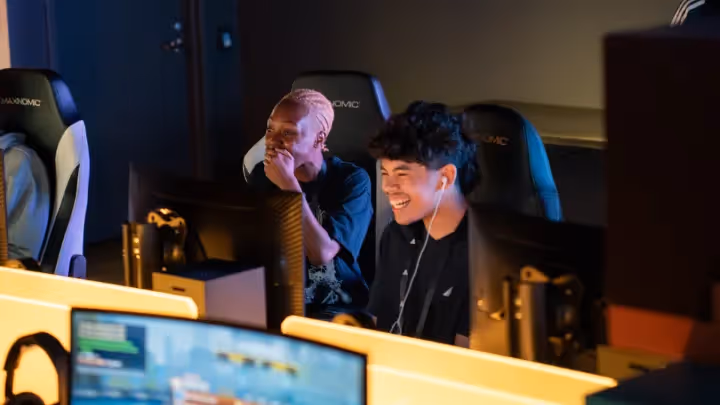 People looking at a computer.