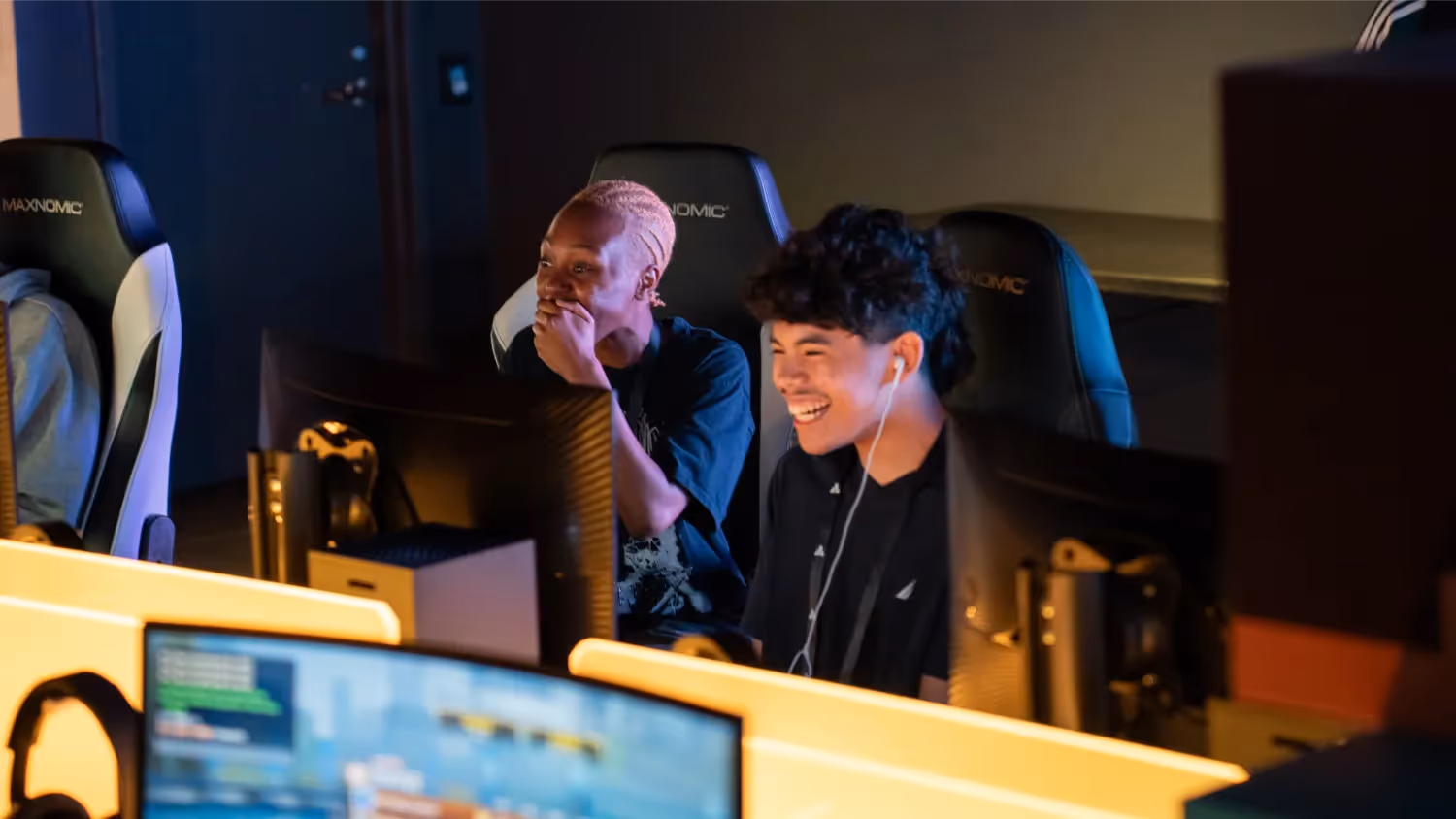 People looking at a computer.