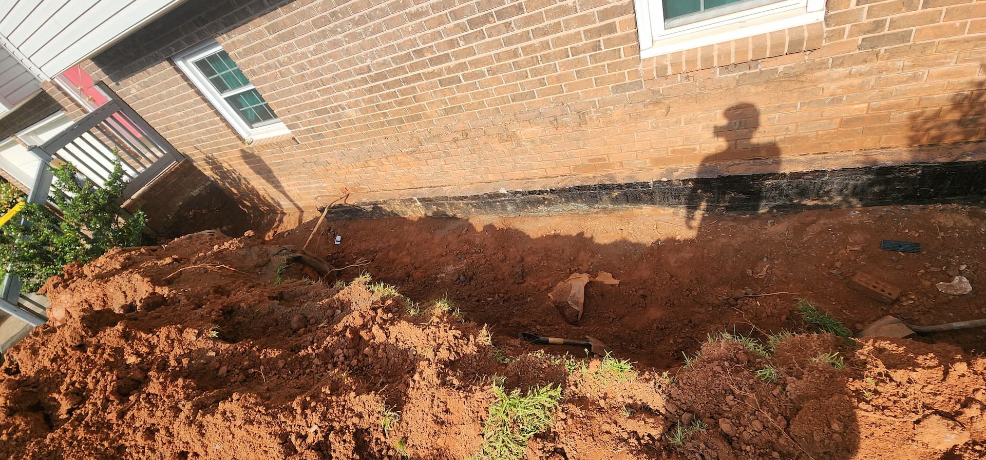 Foundation waterproofing with drainage system installation