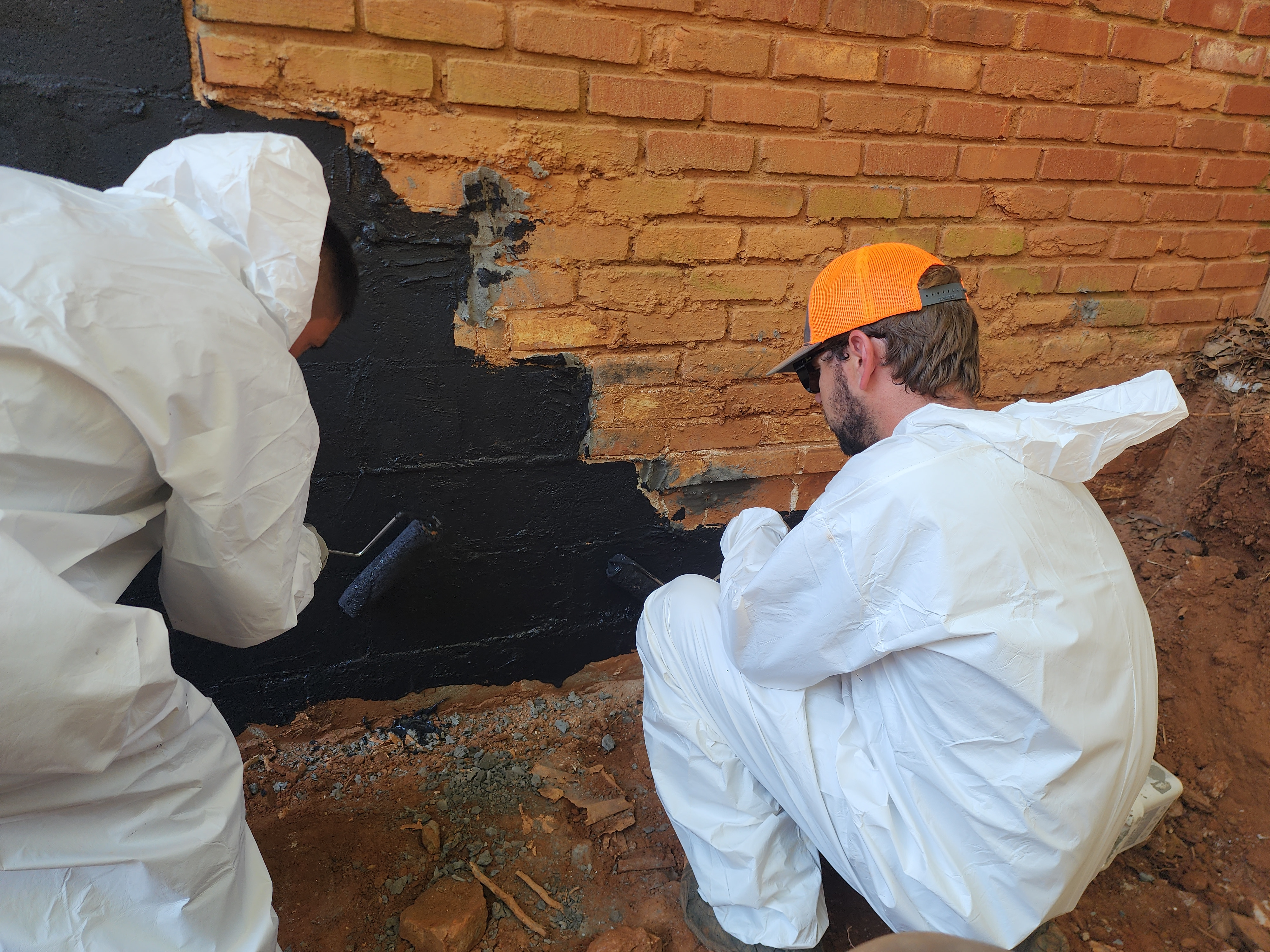 Foundation waterproofing with drainage system installation