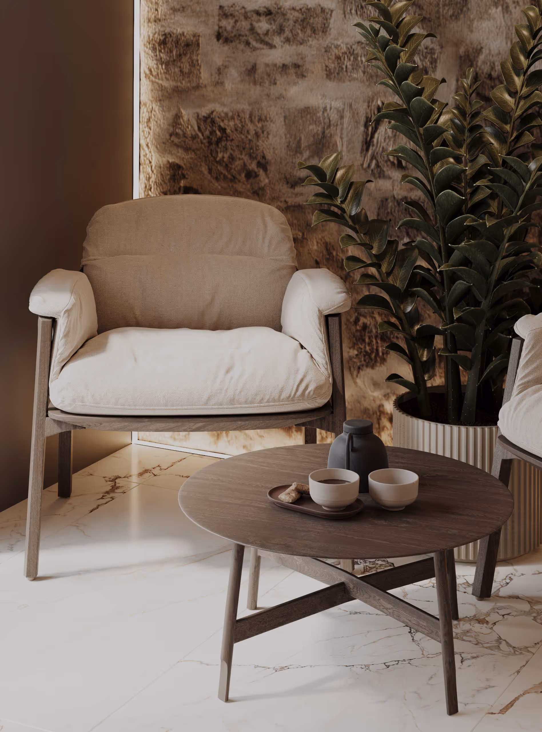 Уютная зона отдыха в шале Alpen Traum — кресло, каменная стена, деревянный столик и чайный сервиз.