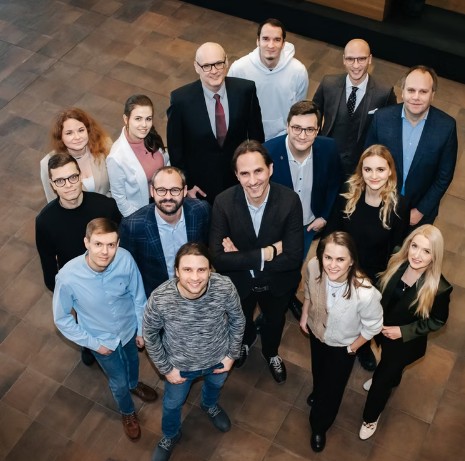 The Axiology team looking up at the camera