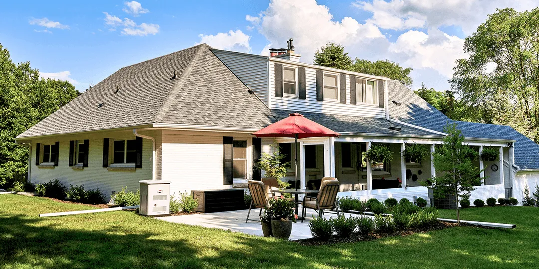 generator hero page image with house and generator outside