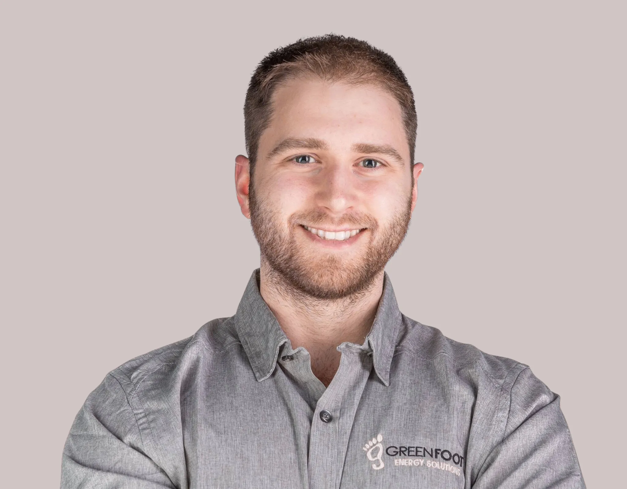 a man smiling for a picture