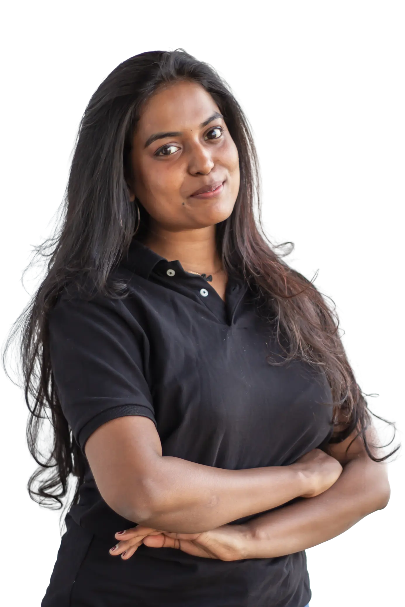Woman with long dark hair wearing a black polo shirt, smiling with arms crossed.