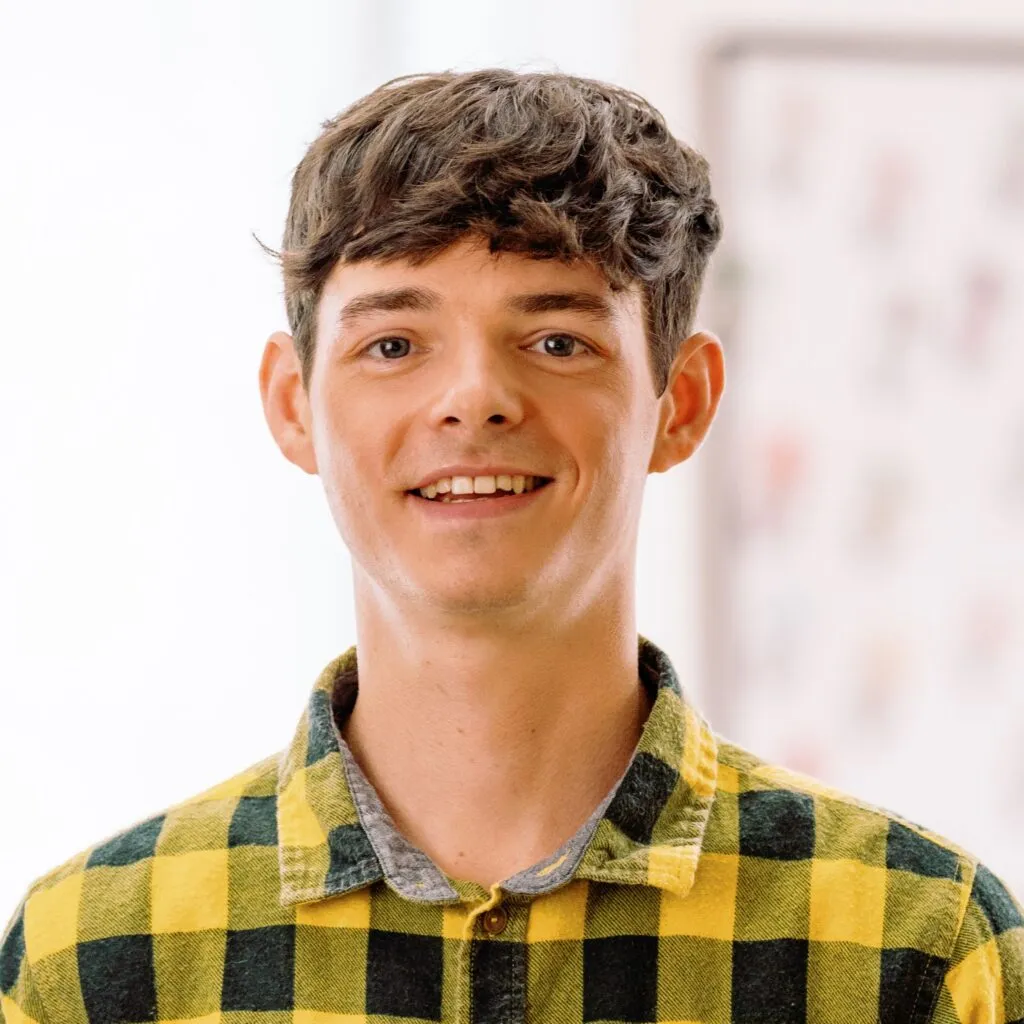 Headshot portrait of Finn, a character from the new Bridging Worlds series.