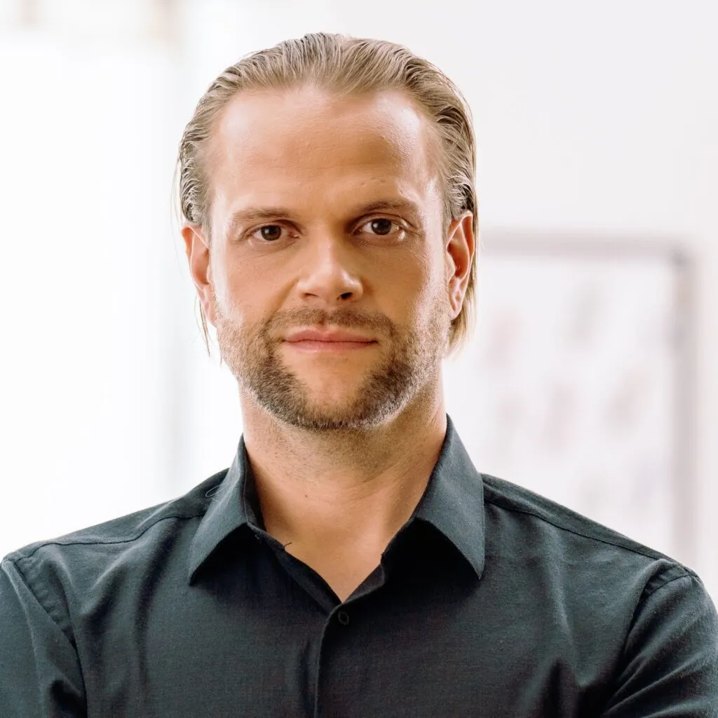 Headshot portrait of Lukas, a character from the new Bridging Worlds series.