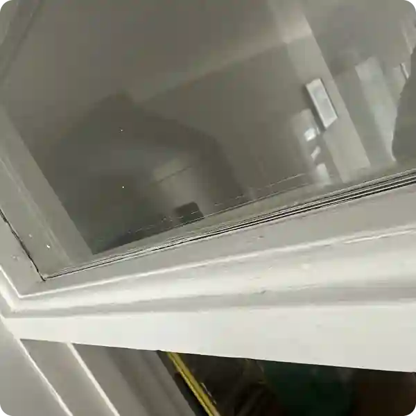 Mould-free window and clean wall after professional treatment, showing improved ventilation and reduced moisture