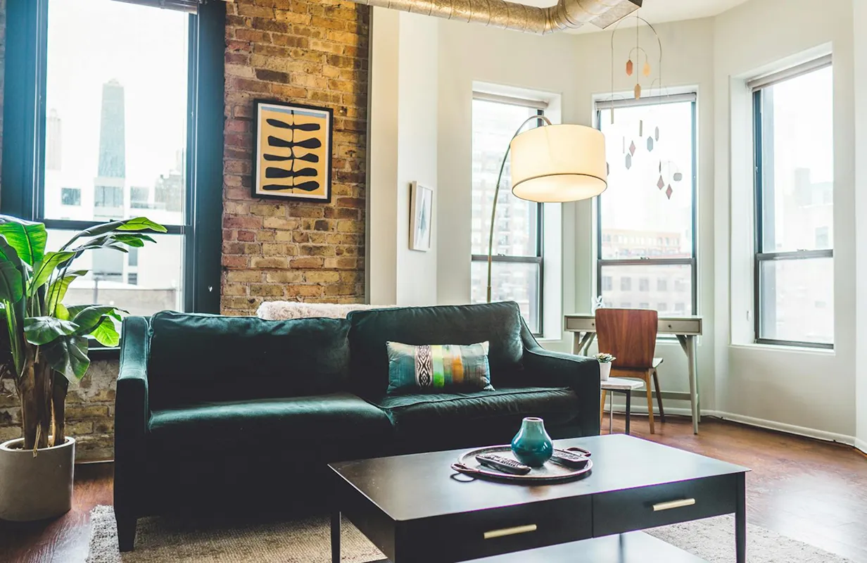 A living room with a couch and a coffee table.