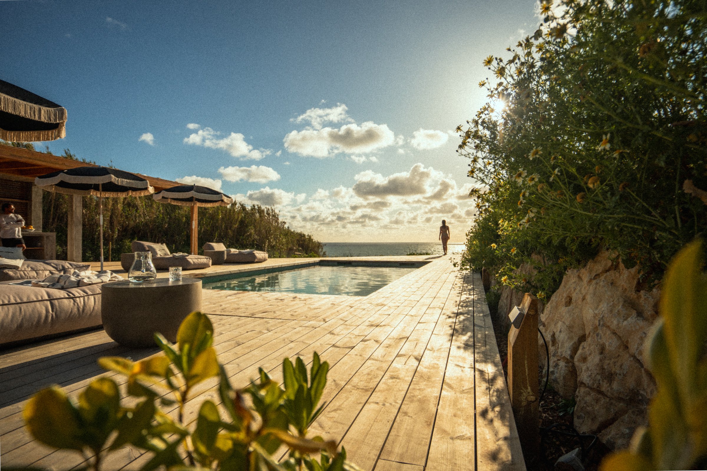 Clifftop pool and timber deck looking out over the Atlantic
