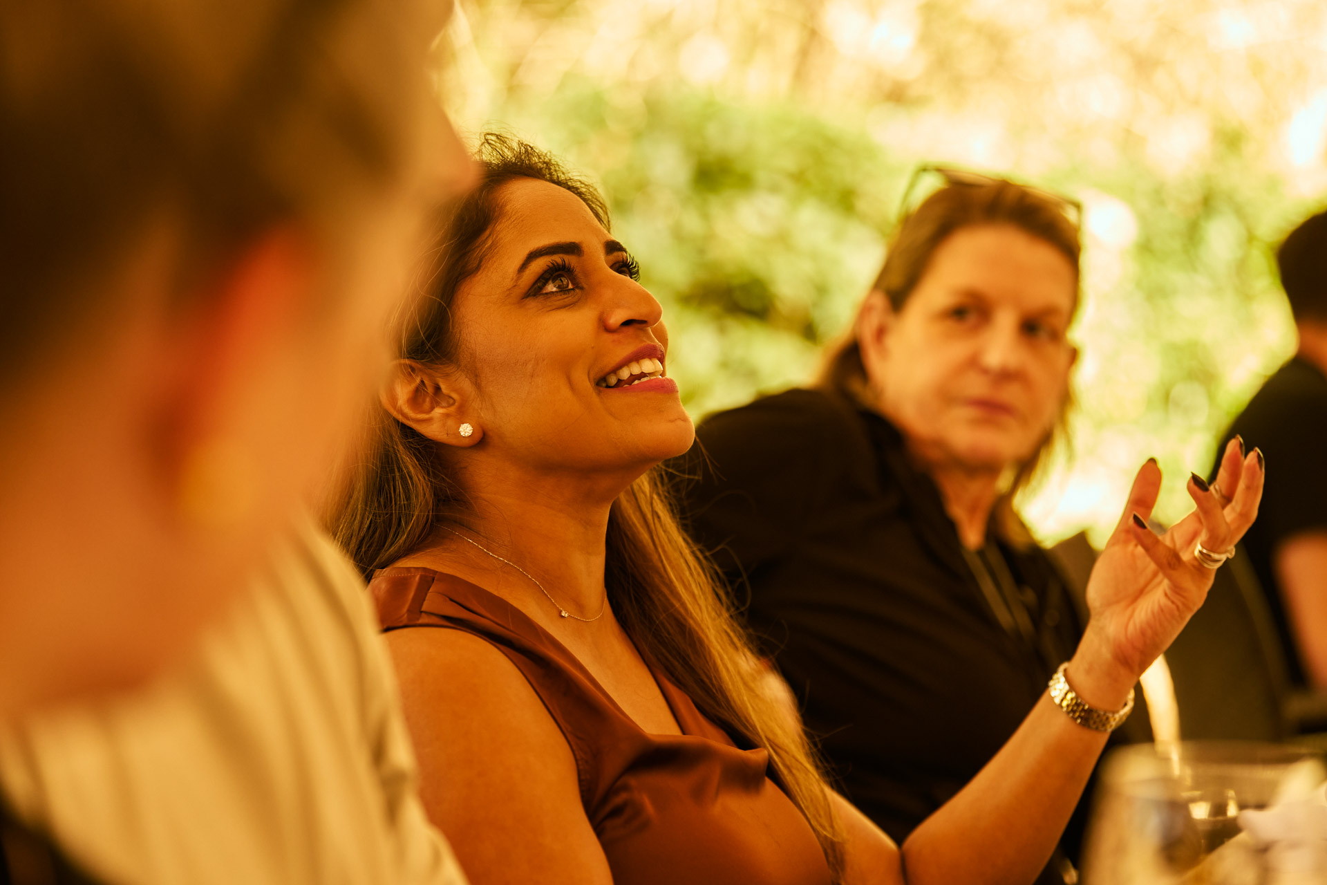 Two participants deep in animated conversation