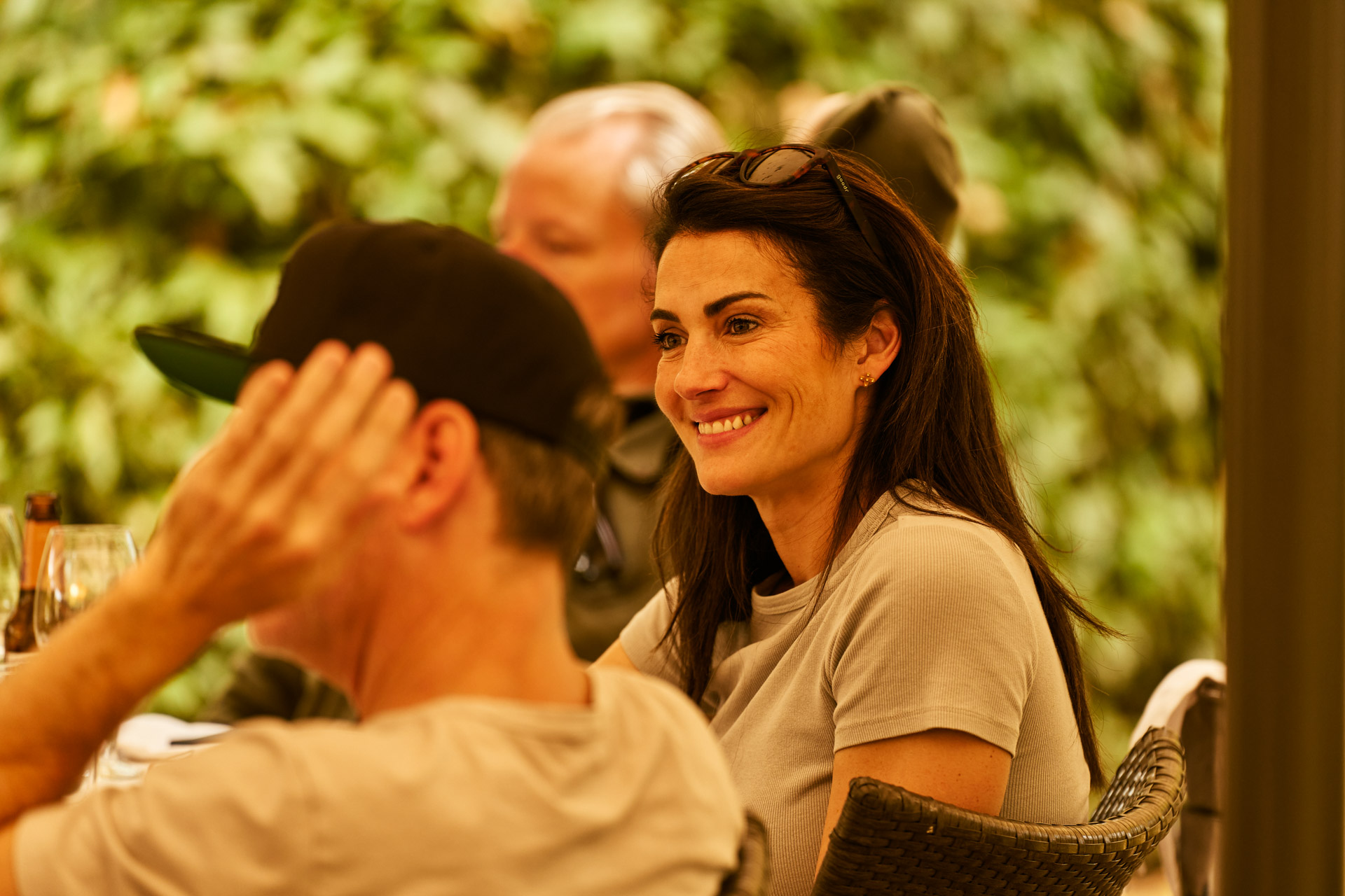 Two participants laughing together at the table