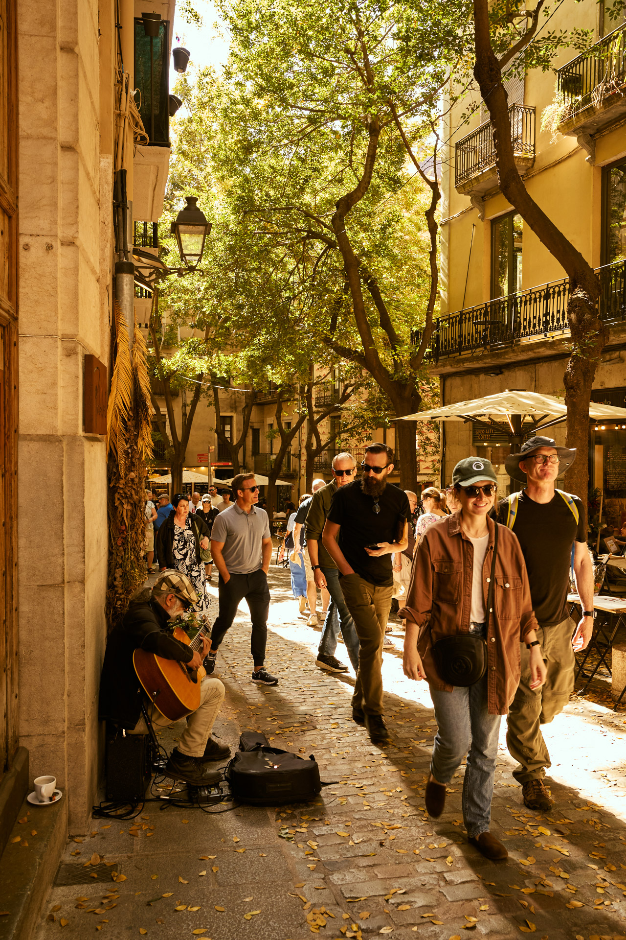 A narrow Girona street in the afternoon light