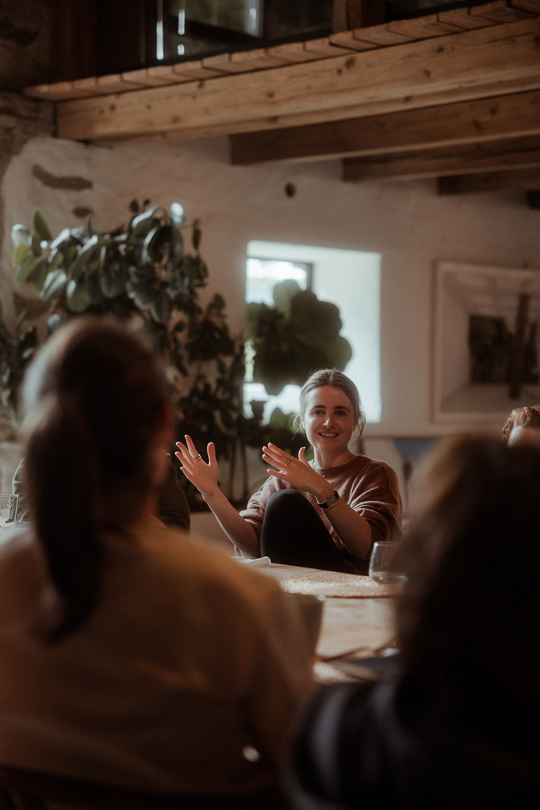 Participants applauding at the table