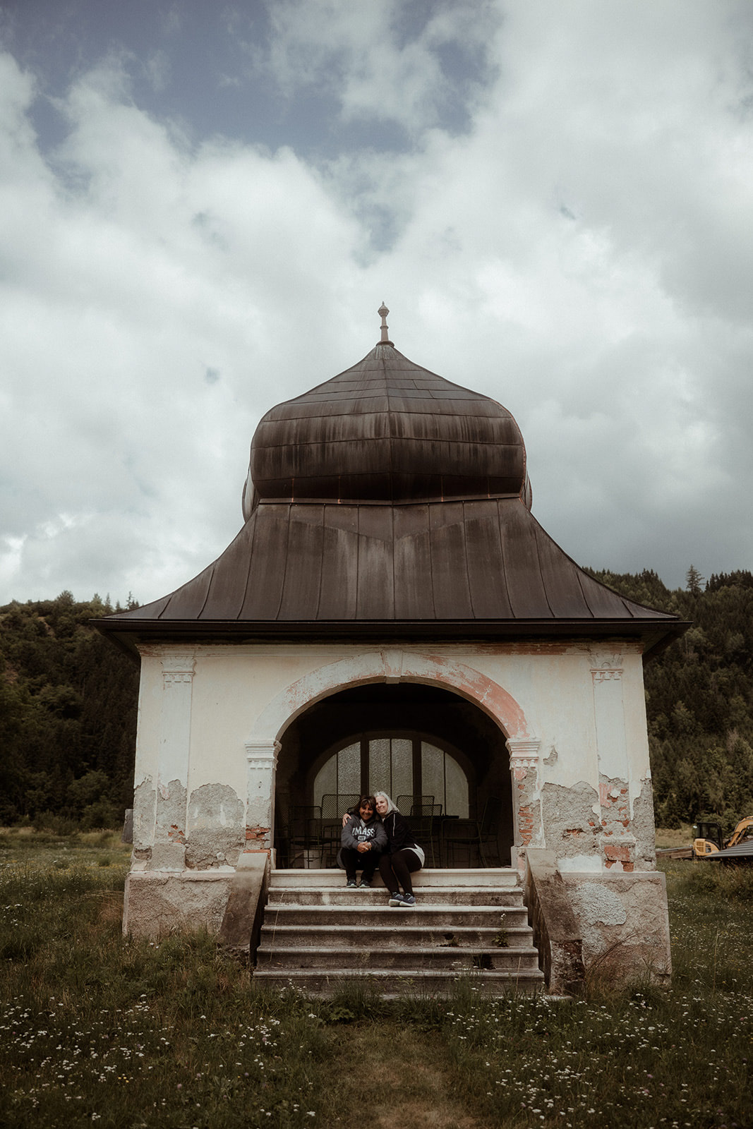 A small onion-domed chapel in the alpine landscape