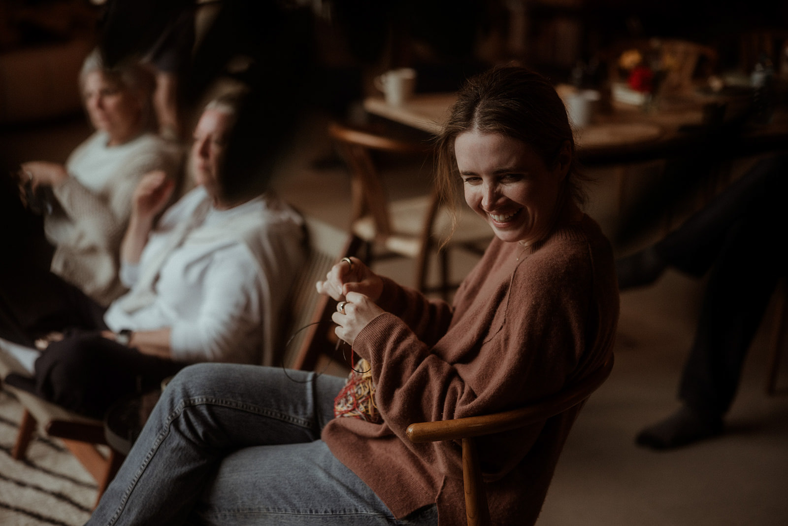 Participants relaxing together in the barn lounge