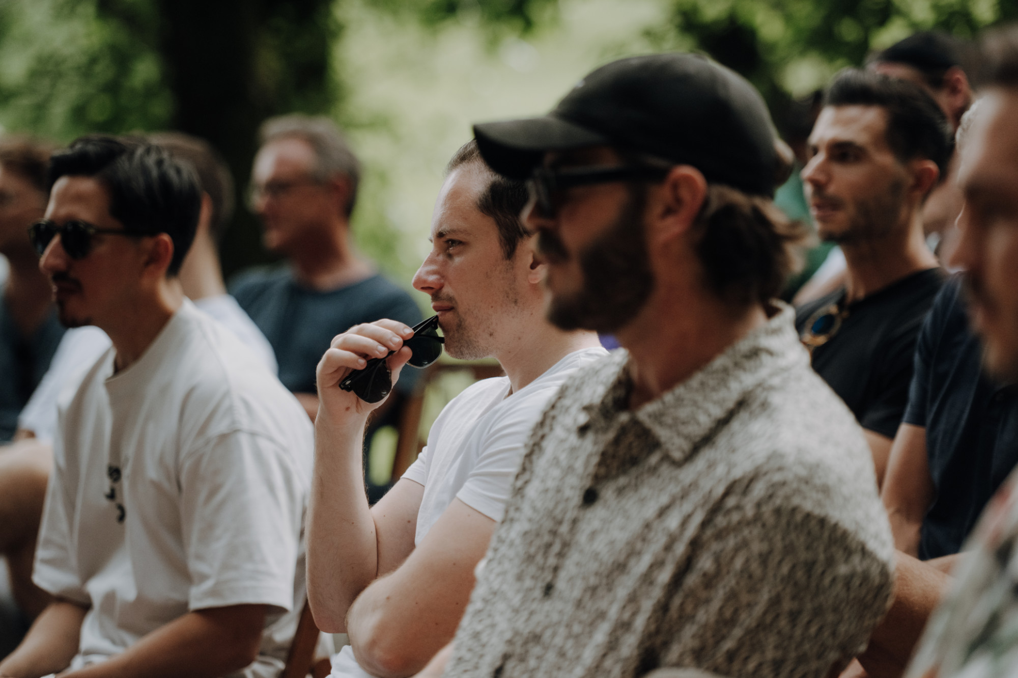 Participants listening during an outdoor session