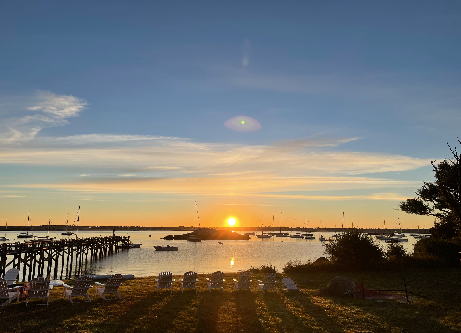 Sunset over the harbour with the pier silhouetted