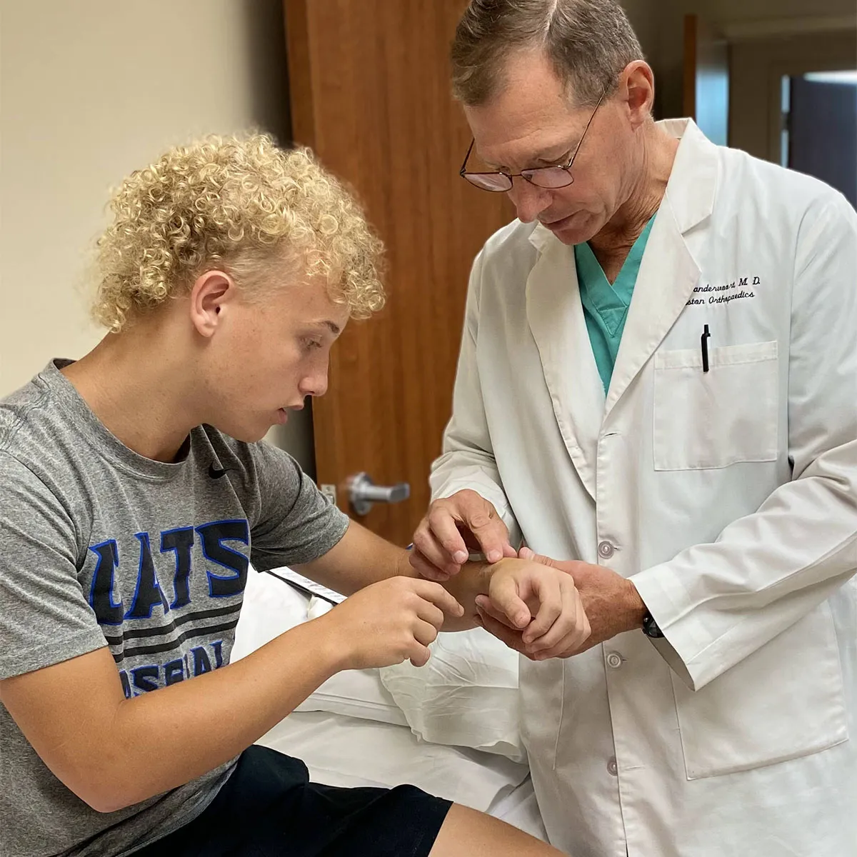 Dr. Vandervoort with a patient.