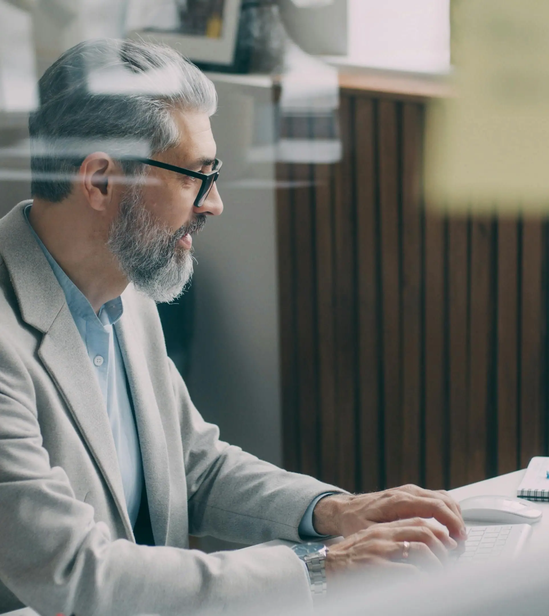 A man typing on a computer