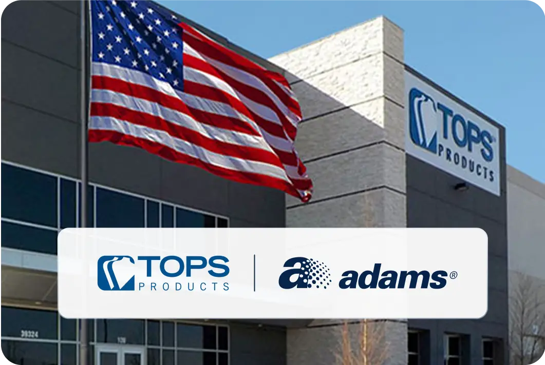 Photo of Tops Products building with USA flag
