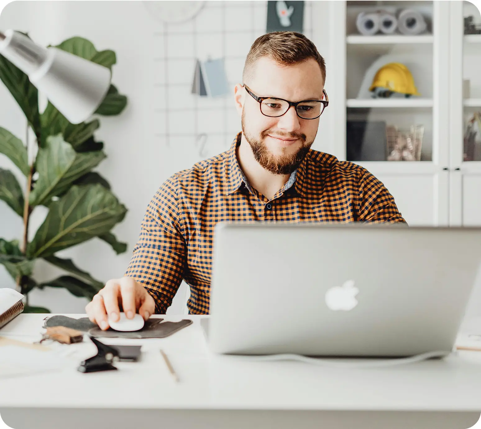 A man typing on a laptop