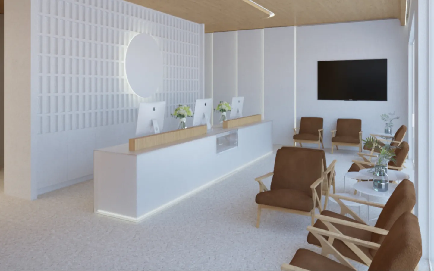 A room with chairs, a table and a flat screen tv.