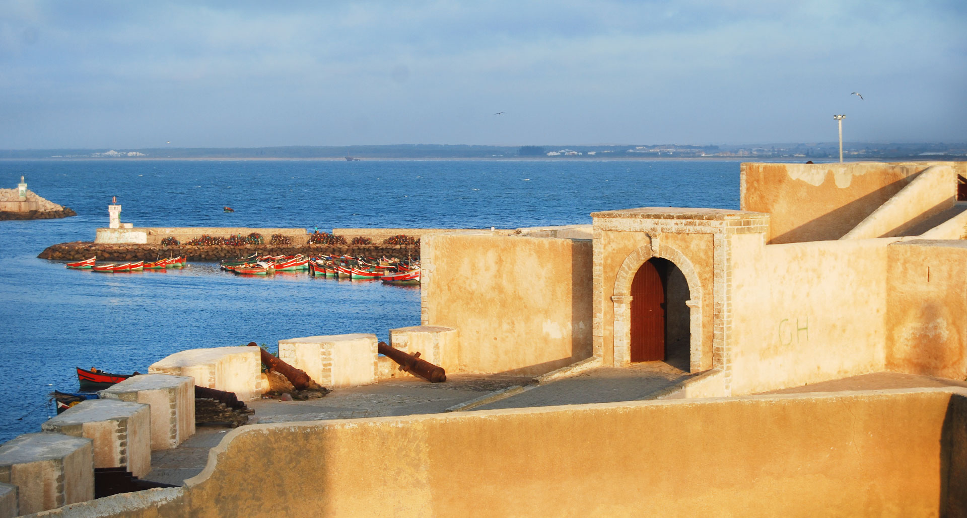 Discover Morocco’s coastal history and scenic charm on a full-day trip from Casablanca to El Jadida, exploring the Portuguese medina, historic cistern, and vibrant harbor views.