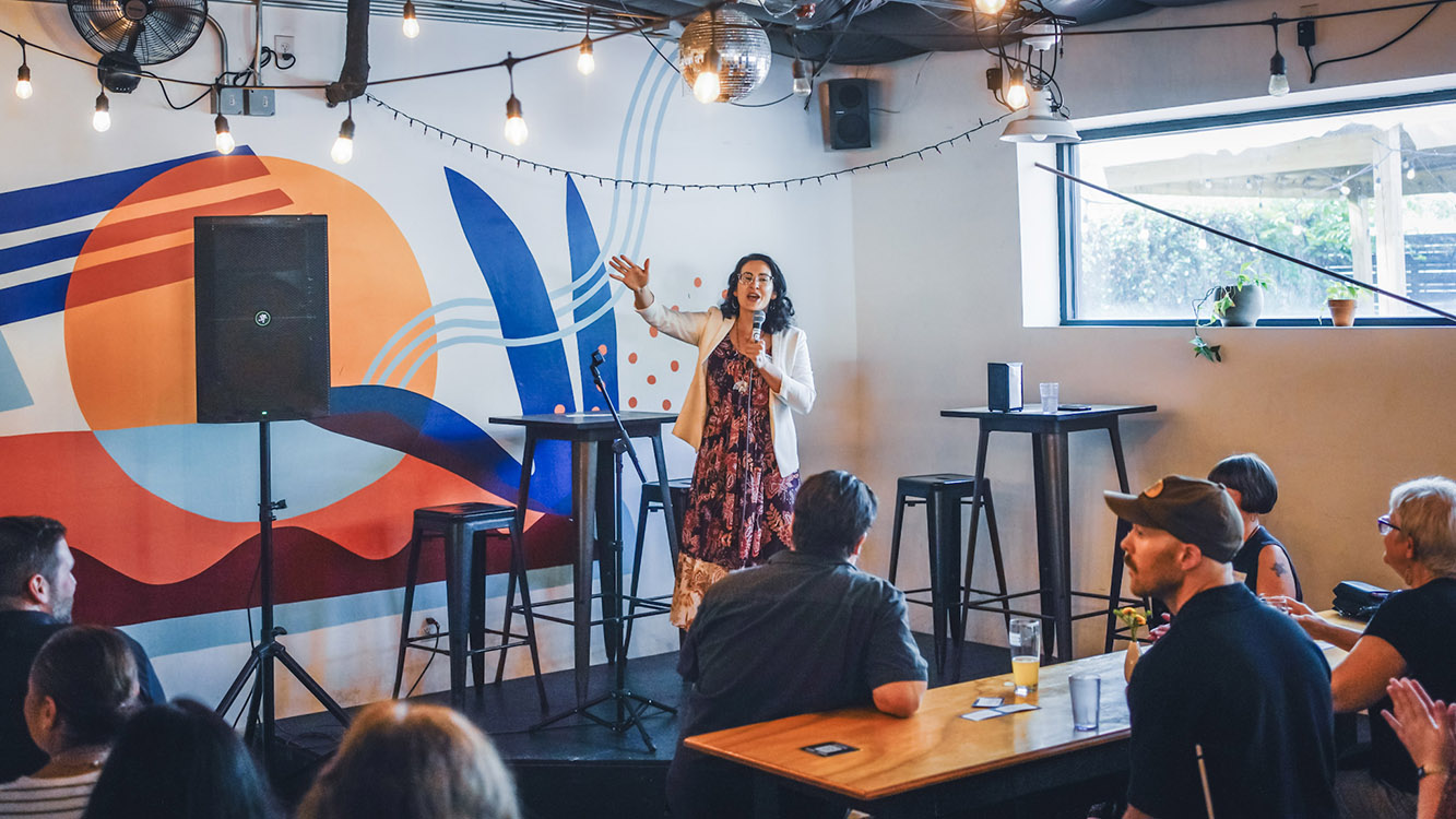 Guests signing in to the networking event Angry Hour: Austin.