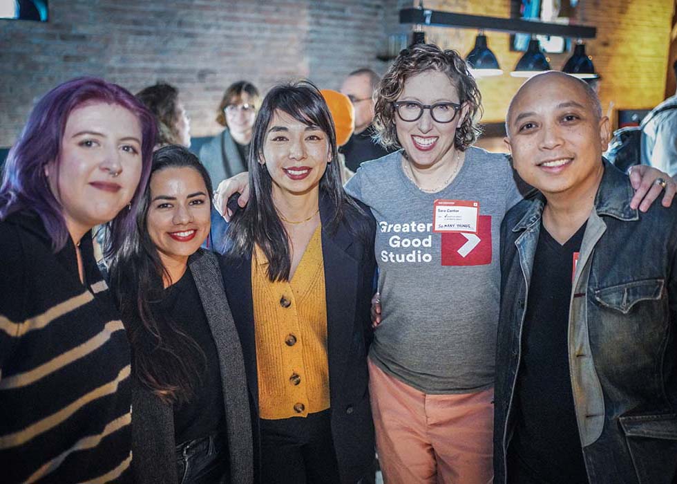 Members of the Greater Good Studio team pose for a picture at Angry Hour: Chicago.