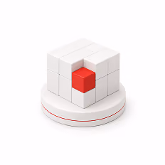 White cube made of smaller blocks with a single red cube in the center on a round white base.