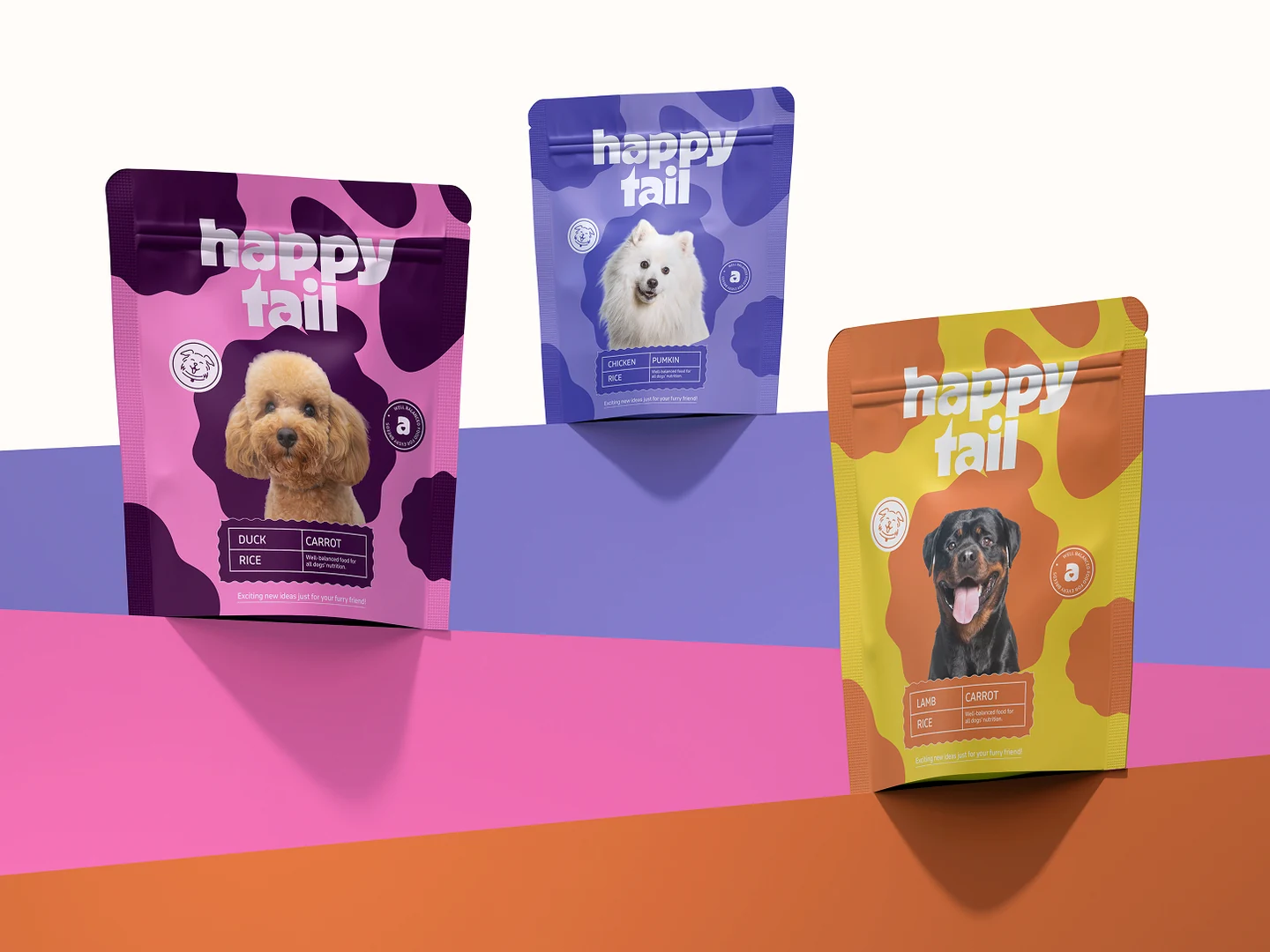Happy Tail Packaging Brand Identity by Wolfpixel Happy Tail pet food packaging by Wolfpixel, using a consistent white wordmark and graphic pattern across three colorful pouches.