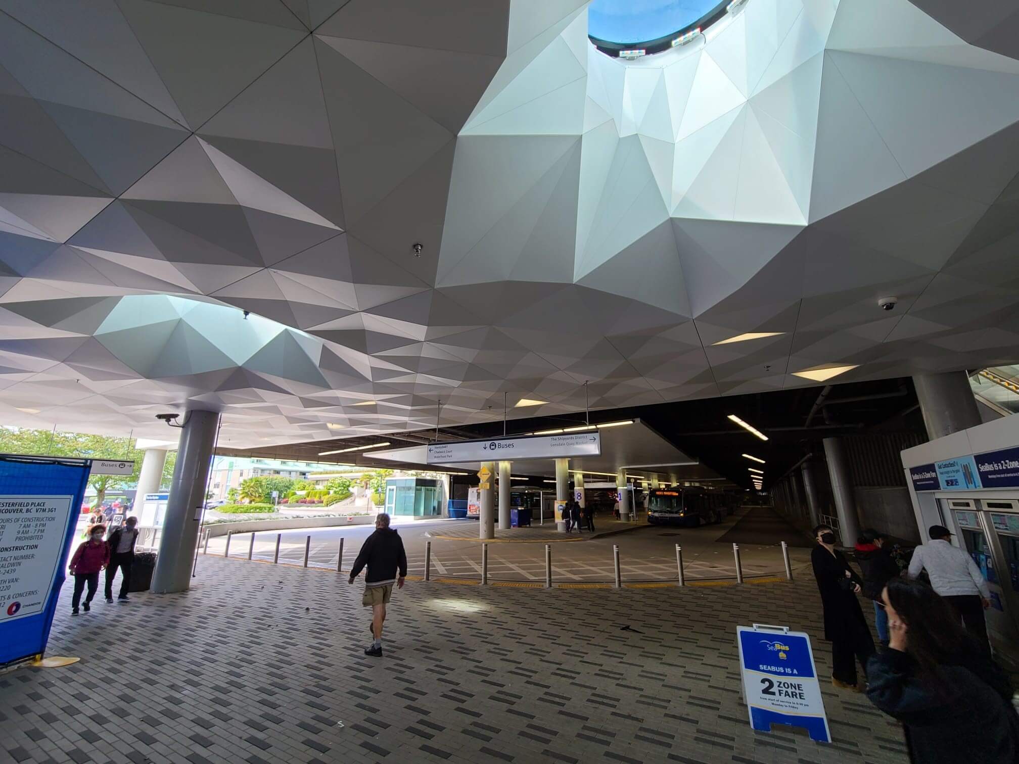 Structural walkable glass floor by Greenlite Glass at TRANSLINK LONSDALE BUS LOOP, North Vancouver, BC.
