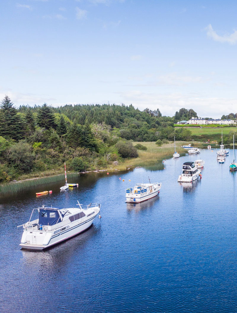 A row of large boats on a body of water