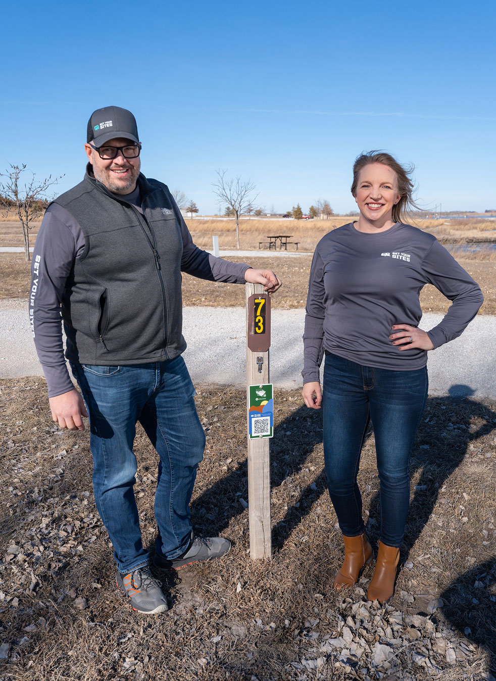 The founders standing in campsite