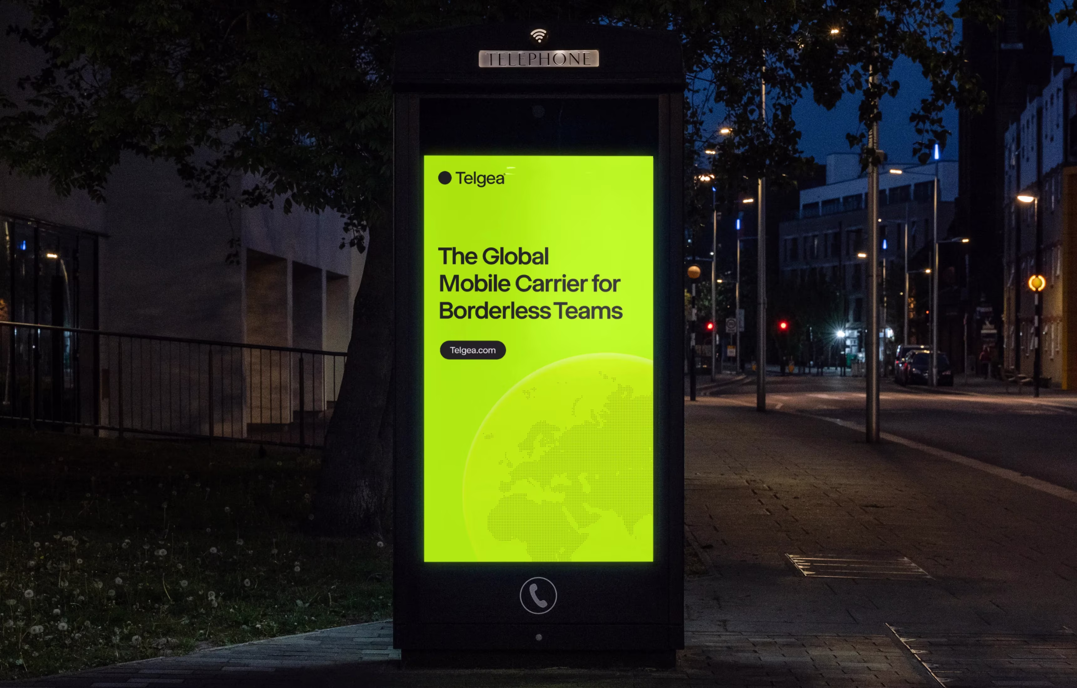 Bright billboard in dark street