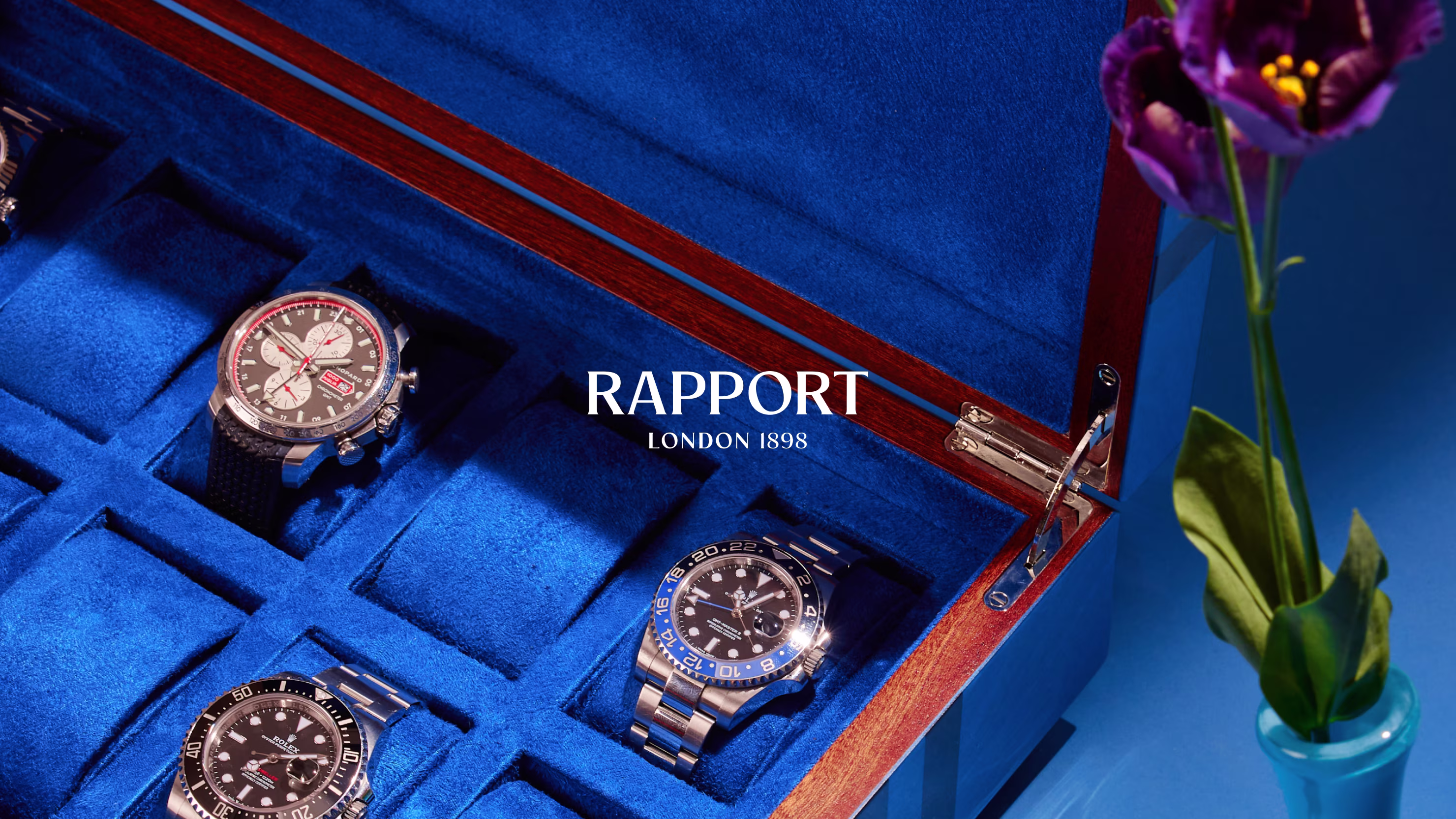 Rapport London logo with a blue watchbox