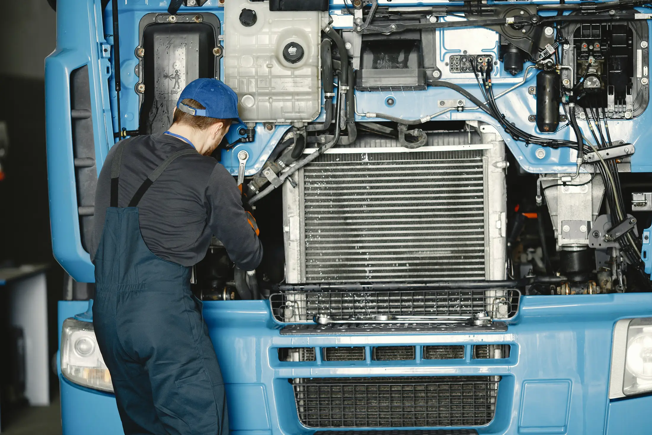 Diesel mechanic performing truck repair in Woodstock, ON