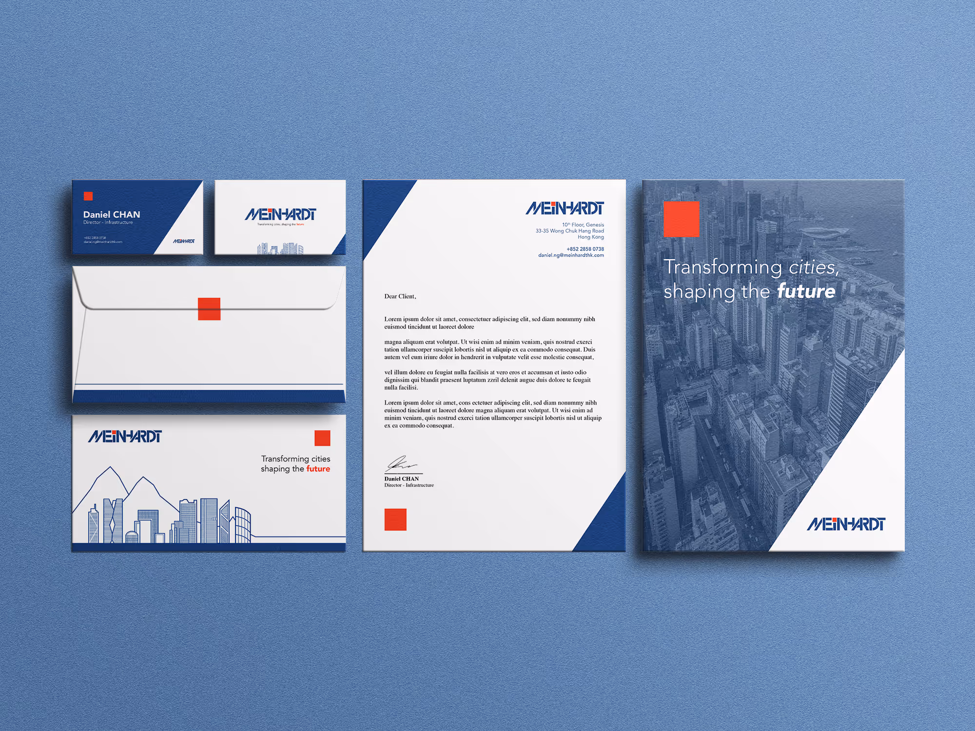 Corporate stationery set including business cards, envelopes, letterhead, and brochure for Meinhardt with blue and white color scheme and cityscape graphics.
