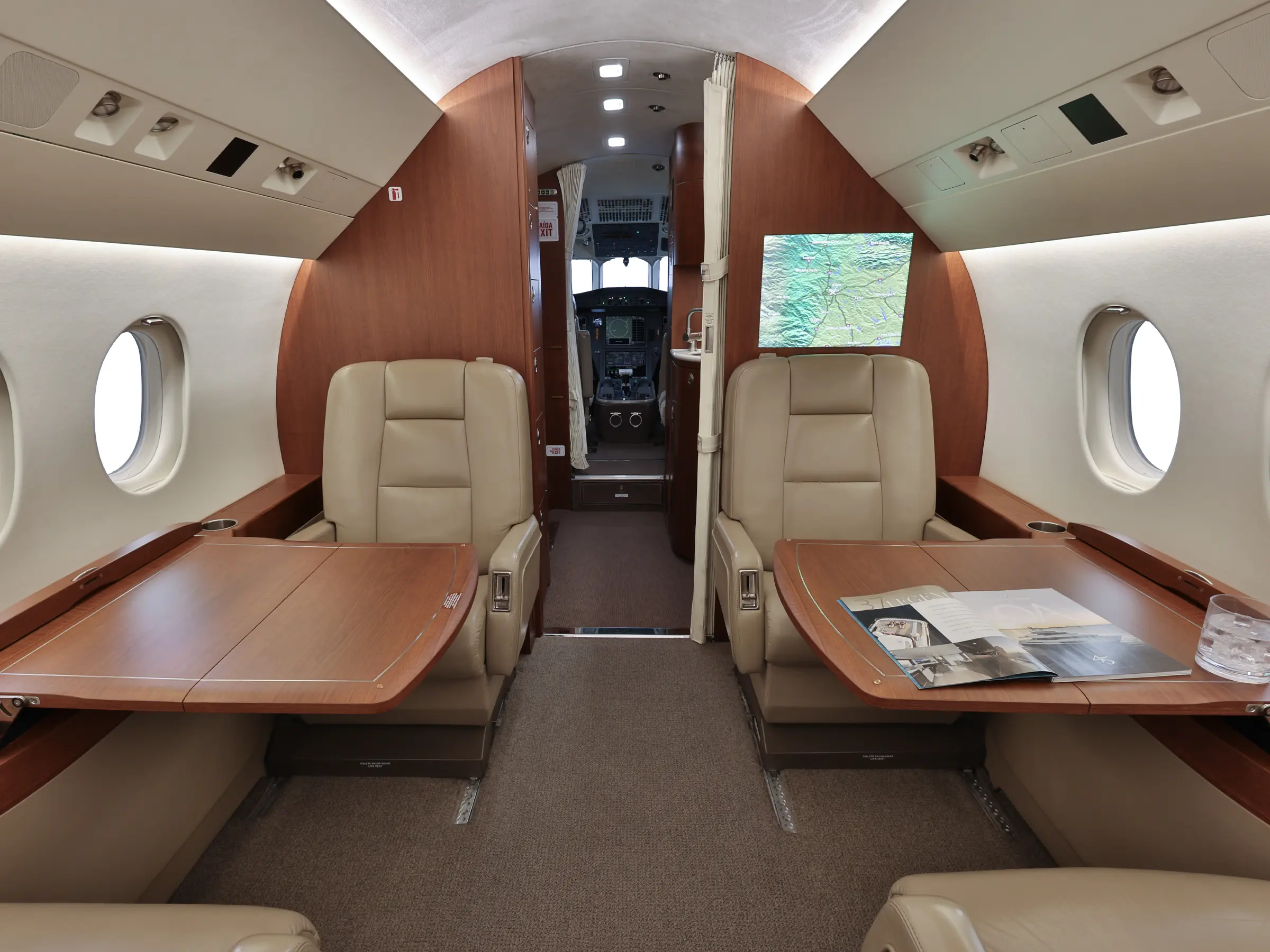 The main cabin of the Falcon 2000LX through the forward galley toward the cockpit