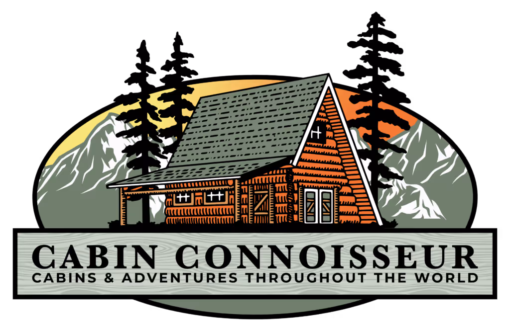 Logo with an illustrated wooden cabin in front of pine trees and mountains at sunset, with text 'Cabin Connoisseur cabins & adventures throughout the world.'