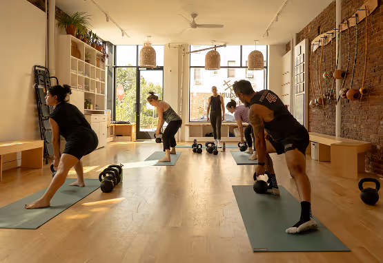 Kettlebell class in session at a local fitness studio in Windsor Terrace, Brooklyn Near The Windsor condominiums