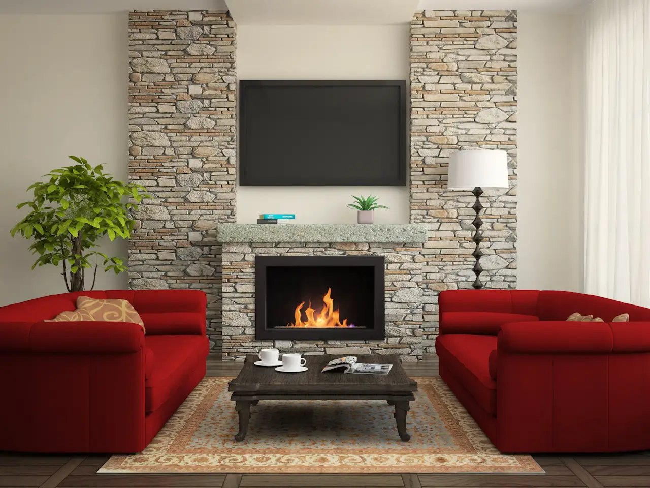 A living room with 2 chairs, a coffee table, and a tv above the fireplace.