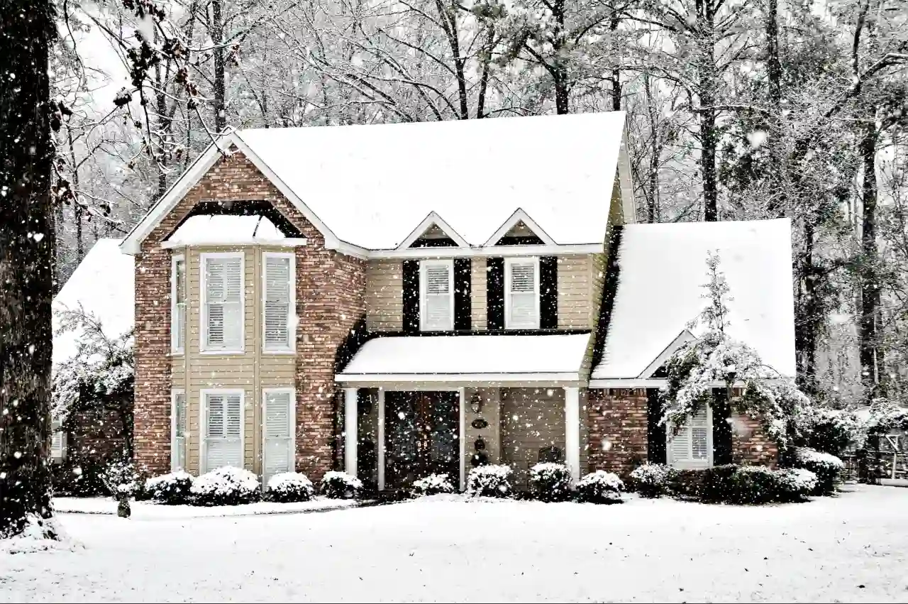 Exterior shot of a house on a snowy day.