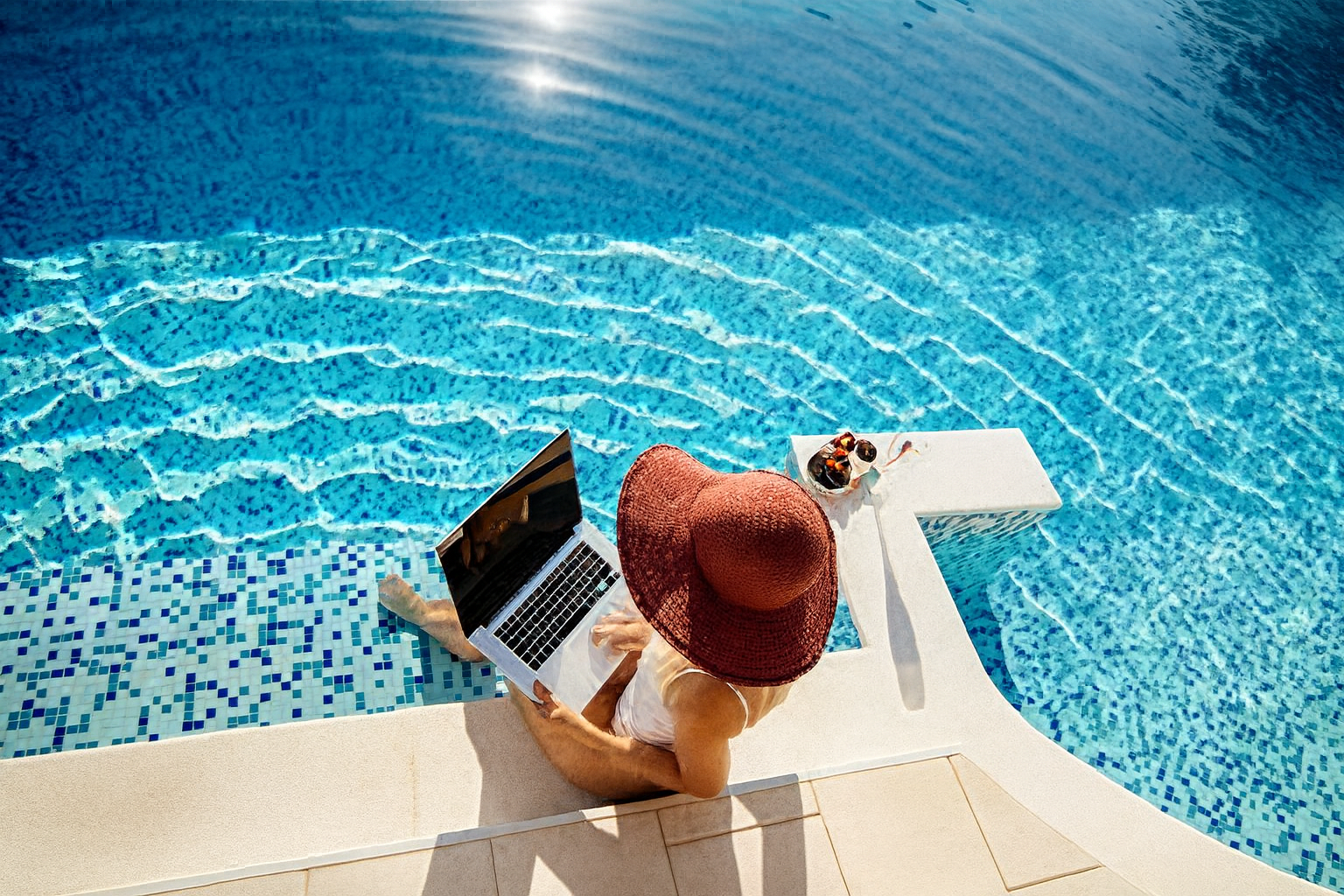 Students relaxing safely at a student housing apartment pool