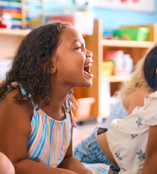 A girl laughing.